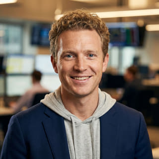 Headshot of Ryan Brooks, shown as Lead Trading Analyst at Prospernage